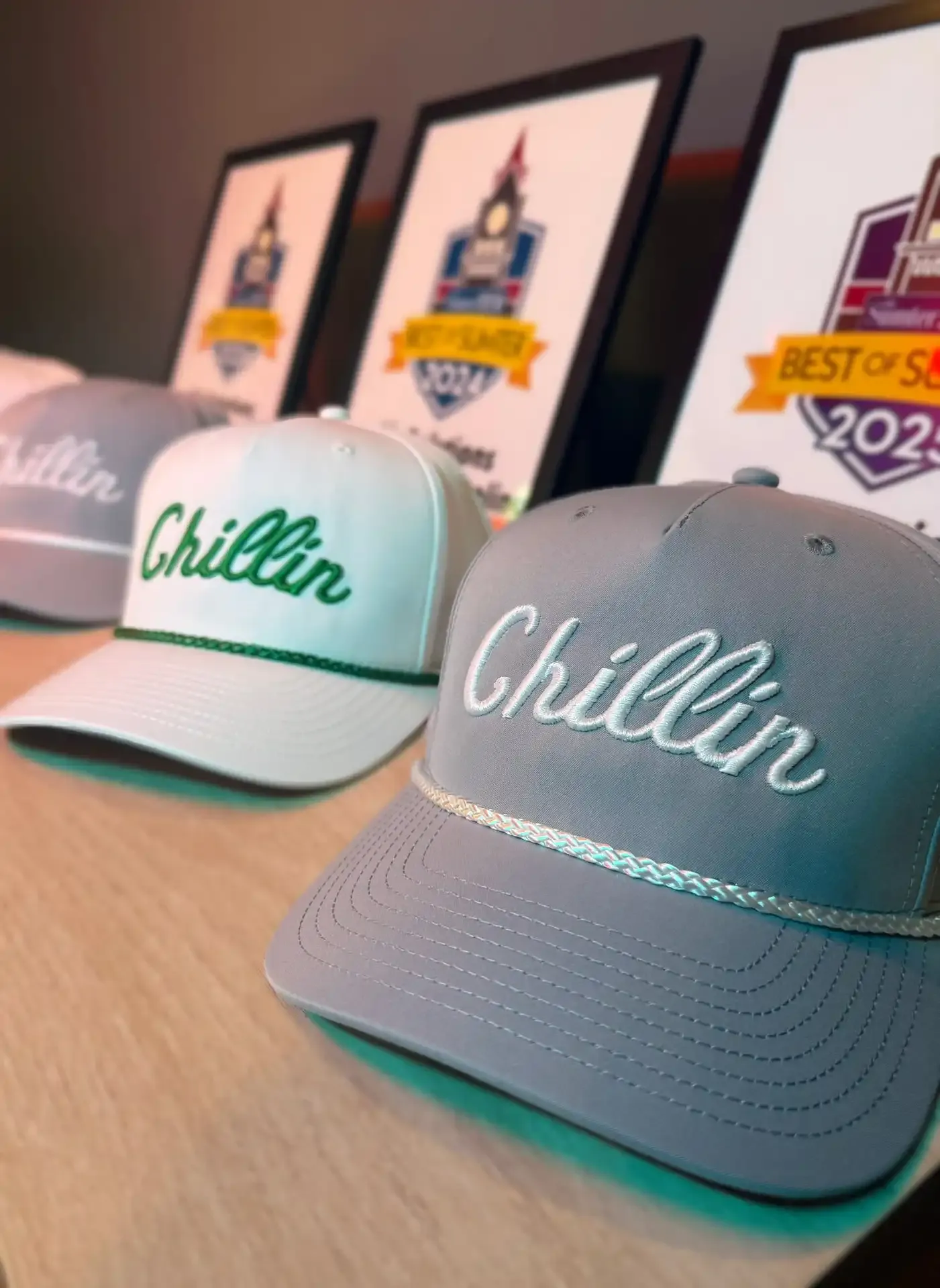 Custom 3D puff script embroidery digitized for rope hats and snapbacks, featuring Chillin' logo by Sassy Digitizing.